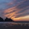 Absolutely stunning landscape images of Holywell Bay beach in Cornwall UK during golden hojur sunset in Spring