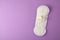 Absorbent protective wipe for women care on lilac background