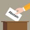 Abstain choice vote hand putting a ballot paper in a slot of box