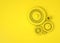 Abstract 3D Geometrical Design. Composition of yellow gears on yellow background. Monochrome. Mechanical technology machine