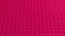 Abstract animated background in pink with texture of crosses