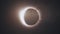 Abstract animation of eclipse of sun. Moon closes sun leaving ring of fire on black background. Animation of an