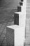 Abstract architecture composition, white square bollards
