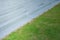 Abstract of architecture concrete staircase beside green grass meadow field at outdoor.