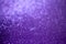 Abstract art background of sparkling purple color glitter texture