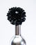 Abstract art. Eternal beauty. Fashion bouquet. Winery concept. Floral wine. Metal flower in steel wine bottle. Forging