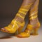 Abstract Art High Heels With Translucent Yellow Liquid