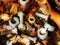 Abstract Art: Rusting Industrial Nuts & Bolts In Dry Leaves, In Distressed Or Washed Cartoon Effect