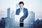 Abstract attractive businessman with tablet and question mark shape on city background. FAQ and answer concept