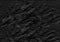Abstract background of black crumpled napkin
