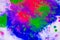 Abstract background of blots pink, green and blue on white paper