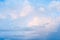 Abstract background blue clouds. Smooth cloudscape of bright colours