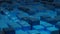 Abstract background with blue colored cubes closeup