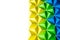 Abstract background with blue, green and yellow origami tetrahedrons