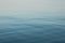 Abstract background of blue water, sea. Blurred background. Rippled water texture. Abstract background of the sea surface