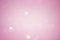 Abstract background blurred focus pink glitter. Pink sparkles defocus light