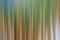Abstract background with blurry stripes shape in vertical lines. Light green and yellow smooth colors background in digital motion