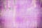 Abstract background of brightly pink color. Stains and streaks of rust.