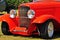 Abstract background close-up front old red hot rod car