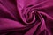 Abstract background clothes violet colour. Amazing waves surface clothes