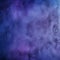 Abstract background composed of colorful smoke in shades of blue, white, purple, and teal. Dynamic and interesting effect.