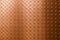 Abstract background of copper texture with a diamond pattern