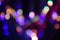 Abstract background with defocused bokeh colorful lights