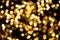 Abstract background of defocused bokeh yellow night small circle light bulb