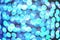 Abstract background, defocused turquoise lights bokeh