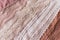 Abstract background of different lace panties in beige shades