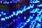 Abstract background festive blurry blue lights garland