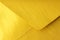 Abstract background in gold color. Detail envelope close up.