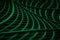 Abstract background with green molded plastic curved geometric 3d lines portraying wired connection