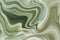 Abstract background of liquid blurred paint color, vibrant gray green wavy background design