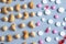 Abstract background of nuts and pills. Healthy  concept.