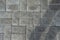 Abstract background. Old cobblestone pavement close-up. City