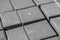 Abstract background. Old cobblestone pavement close-up. City