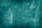 Abstract background of old shabby dark turquoise surface