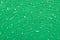 Abstract background, pattern. Texture of a painted green concrece wall with pilled