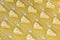 abstract background. patterns of pieces of cheese and forks on a yellow background. 3D render