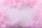 Abstract background. Pink downy feathers