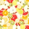 Abstract background with slices of fresh fruits. Seamless pattern for a design. Close-up.