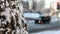 Abstract background with snow-covered trees and urban traffic landscape, soft focus, selective focus - image