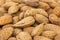Abstract background: unshelled almonds