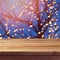 Abstract background with wooden empty table over festive tree bokeh