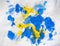 Abstract background. Yellow and blue color spots on white paper, close up view. Inkblots on white background. Abstract