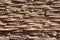 Abstract beige brown slate pattern stone block wall texture for background and wallpaper large and wide modern stone