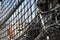 Abstract black netting on old clipper ship in harbour.