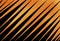 Abstract black and orange background with diagonal or angled stripes and texture