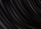 Abstract black silk cloth background.Drapery black background